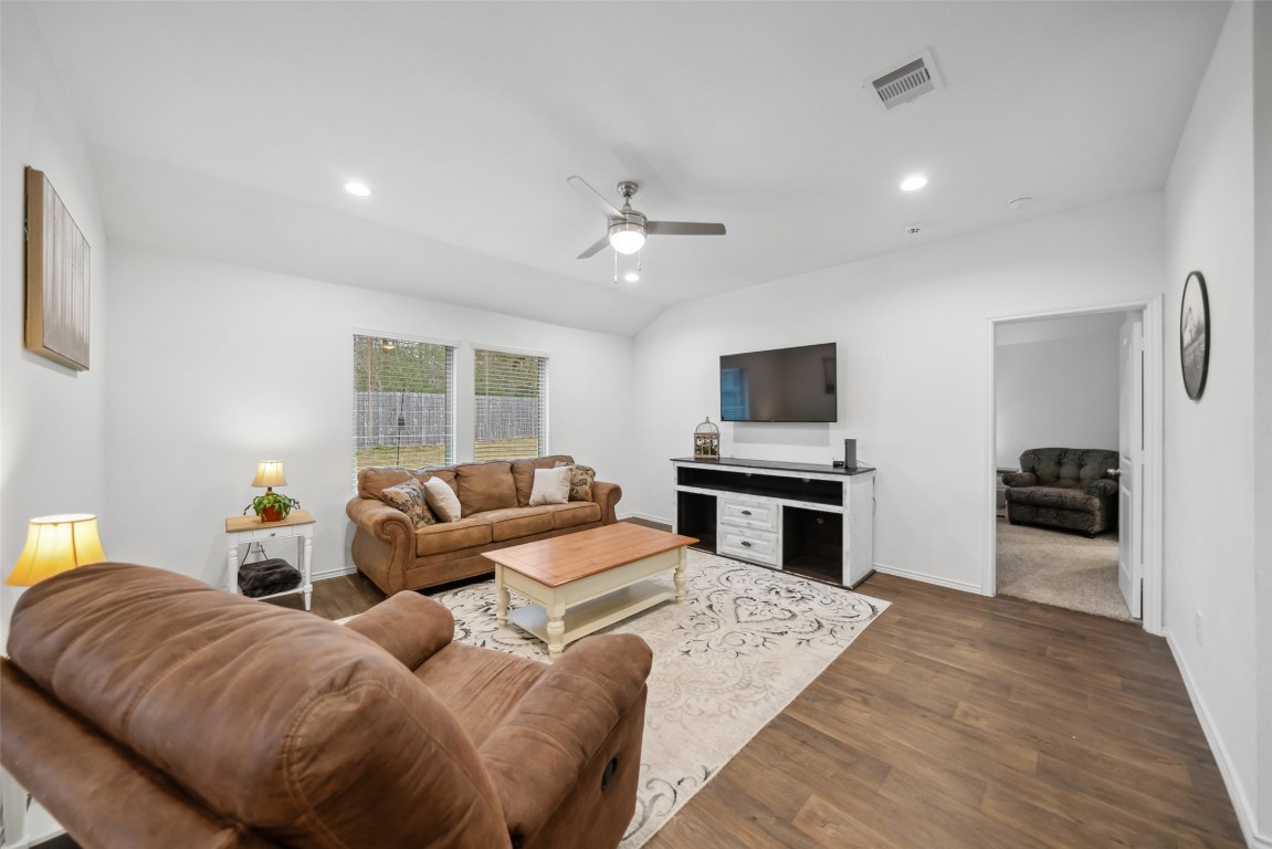 3308 Cold Swan Court Conroe, TX 77301 - Photo 16 of 25 TV can be seen from the kitchen and dining area.