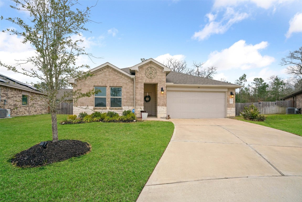 3308 Cold Swan Court Conroe, TX 77301 - Photo 2 of 25 Home is almost 4 years old with a private backyard that backs up to woods.