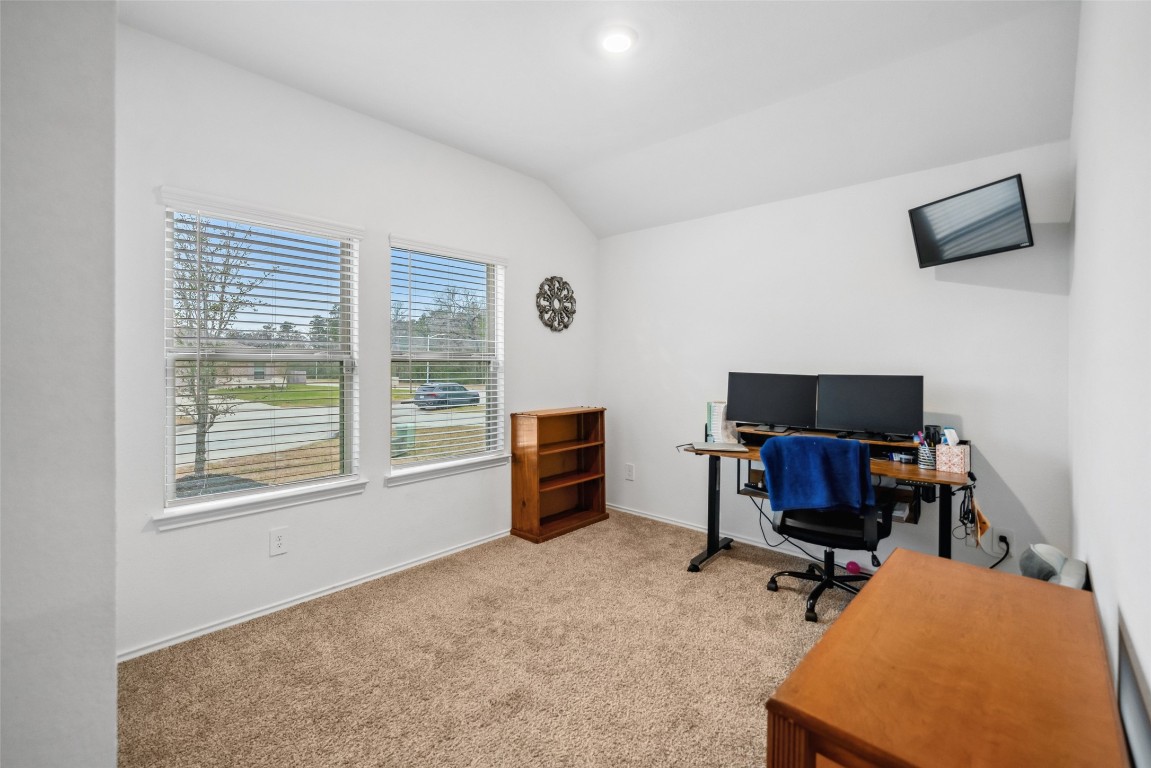 3308 Cold Swan Court Conroe, TX 77301 - Photo 3 of 25 Front bedroom has nice view and is being utilized as a home office.