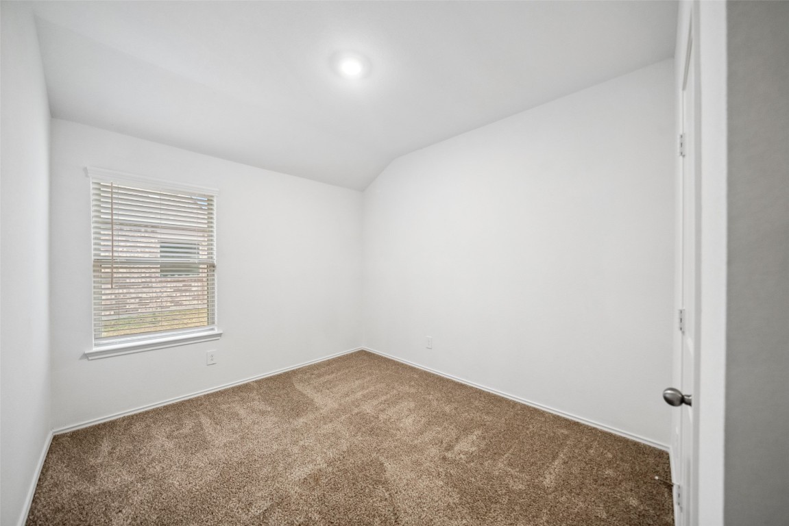 3308 Cold Swan Court Conroe, TX 77301 - Photo 5 of 25 2nd Bedroom is empty and can be utilized however you desire.