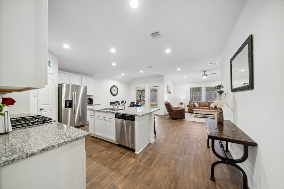 3308 Cold Swan Court Conroe, TX 77301 - Photo 7 of 25 Entry into lovely kitchen, dining & family room areas.