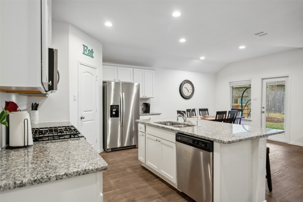 3308 Cold Swan Court Conroe, TX 77301 - Photo 10 of 25 Kitchen & dining area faces the backyard.