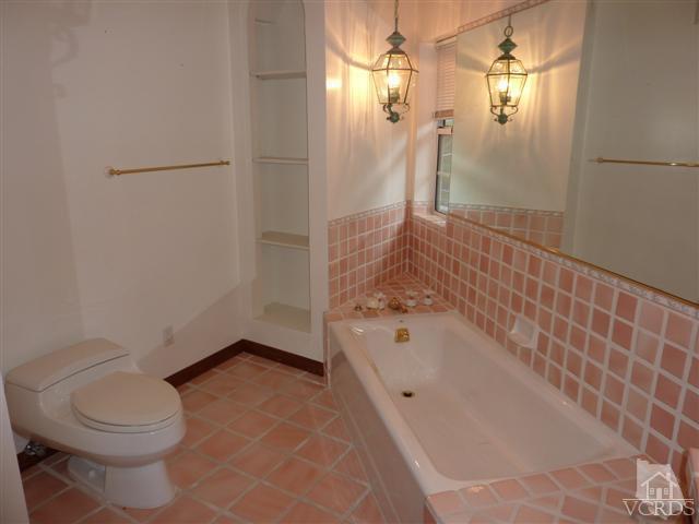 51 Buckskin Road Bell Canyon, CA 91307 - Photo 15 of 24 a bathroom with a bathtub and a shower