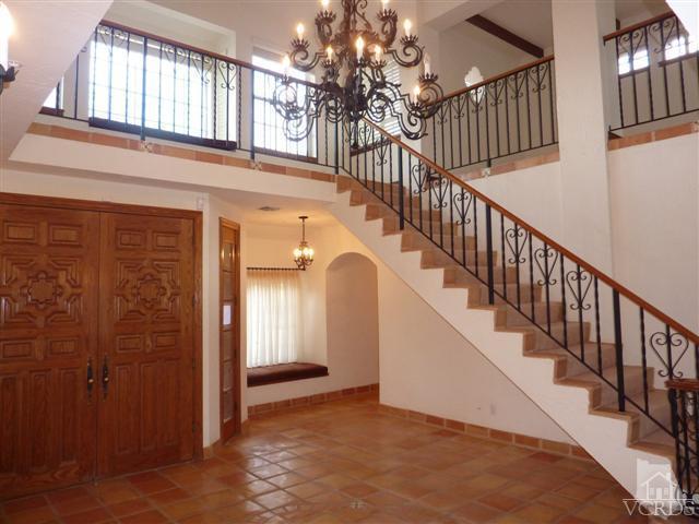 51 Buckskin Road Bell Canyon, CA 91307 - Photo 3 of 24 a view of staircase with railing and a chandelier