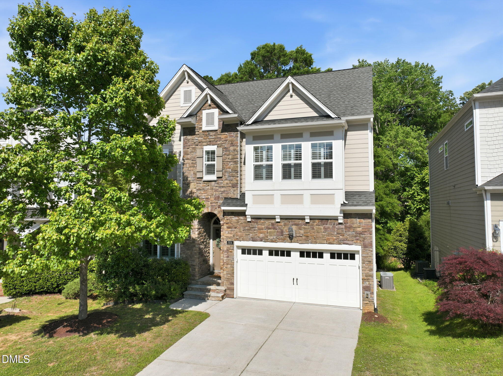 804 Long Meadows Road Chapel Hill, NC 27516 - Photo 1 of 50 a front view of a house with a yard
