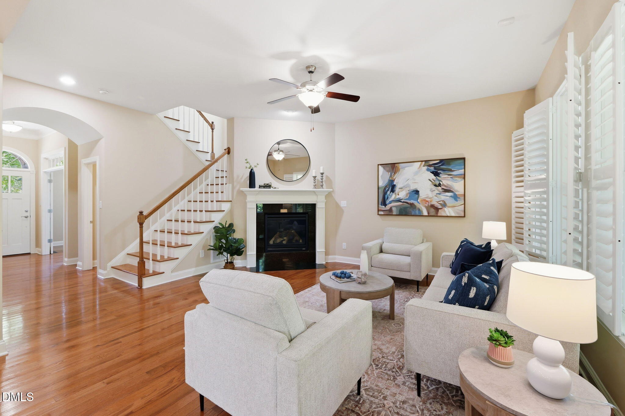 804 Long Meadows Road Chapel Hill, NC 27516 - Photo 18 of 50 a living room with furniture a fireplace and wooden floor