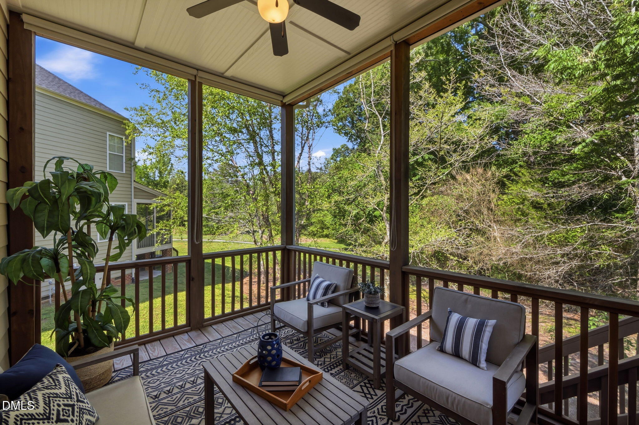 804 Long Meadows Road Chapel Hill, NC 27516 - Photo 19 of 50 a balcony with furniture and wooden floor