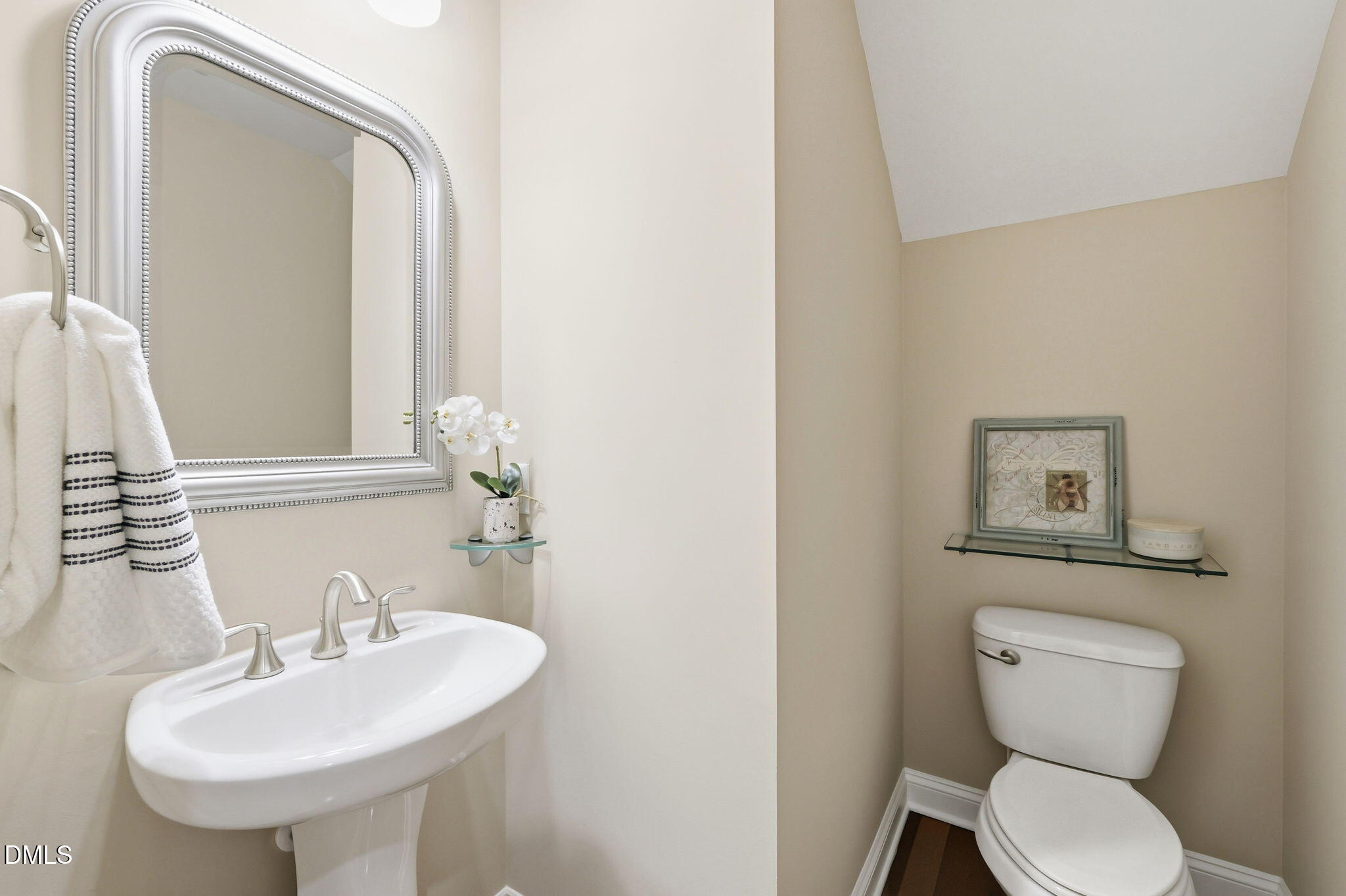804 Long Meadows Road Chapel Hill, NC 27516 - Photo 21 of 50 a bathroom with a toilet sink and mirror