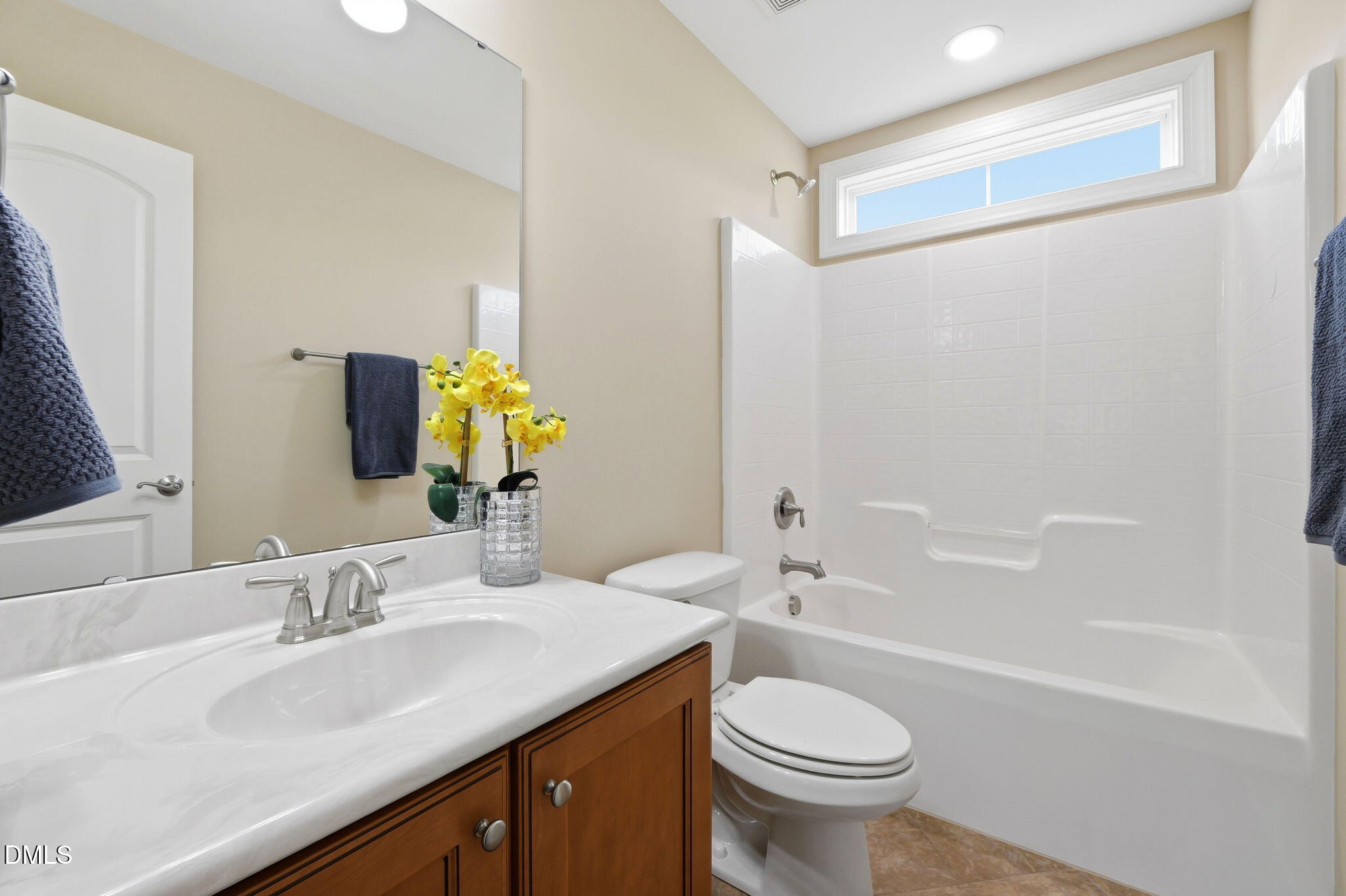 804 Long Meadows Road Chapel Hill, NC 27516 - Photo 40 of 50 a bathroom with a granite countertop toilet sink and a mirror