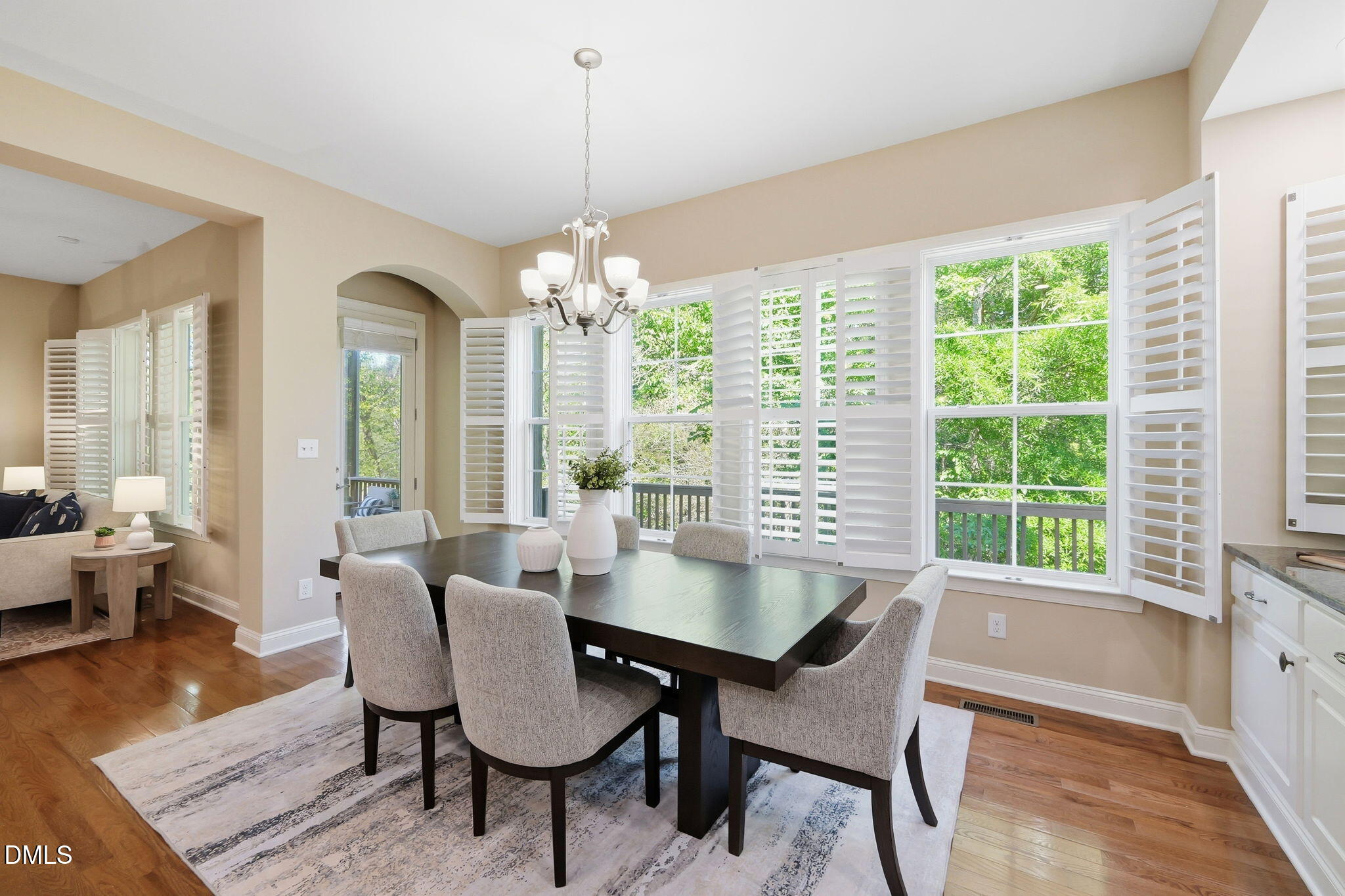 804 Long Meadows Road Chapel Hill, NC 27516 - Photo 9 of 50 a view of a dining room with furniture window and wooden floor