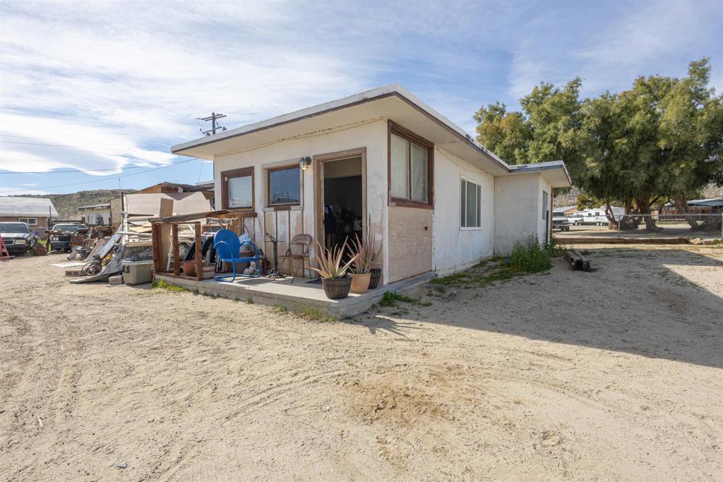 13765 Fremont Street Trona, CA 93562 - Photo 13 of 31 a view of a house with a patio