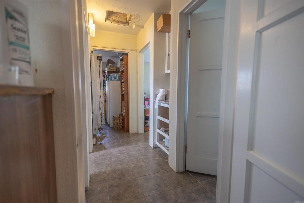 13765 Fremont Street Trona, CA 93562 - Photo 24 of 31 a view of a hallway with closet and a bathroom