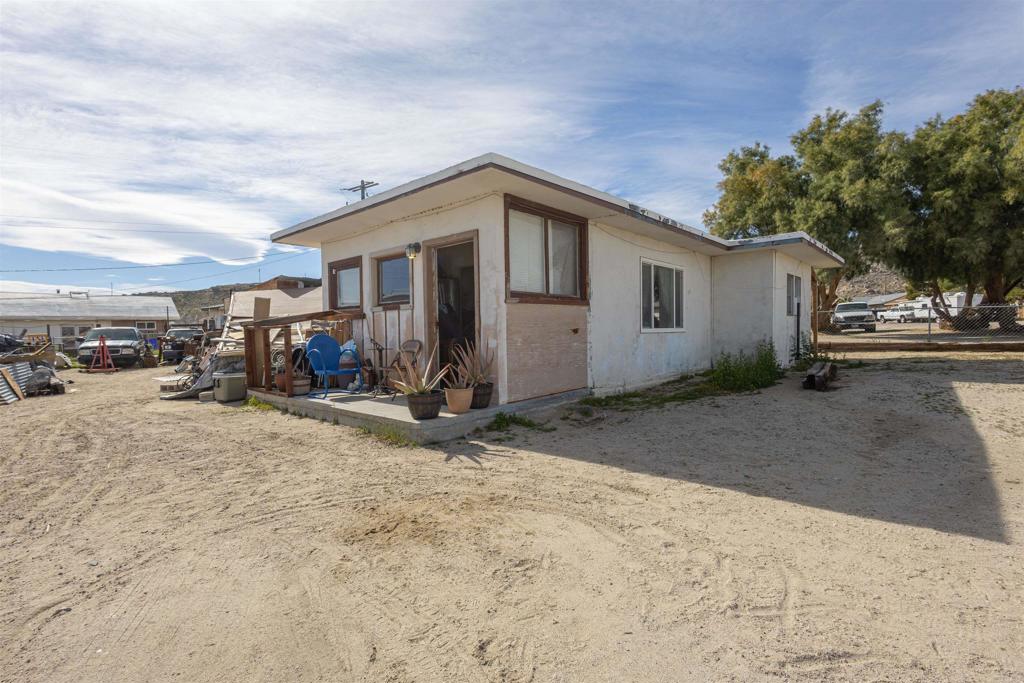 13765 Fremont Street Trona, CA 93562 - Photo 8 of 31 a view of a house with a patio