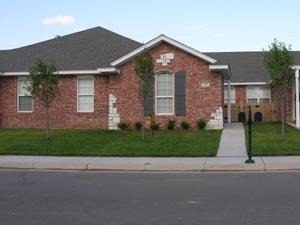 4513 Steffi Court Amarillo, TX 79110 - Photo 1 of 1 a front view of a house with a yard and garage