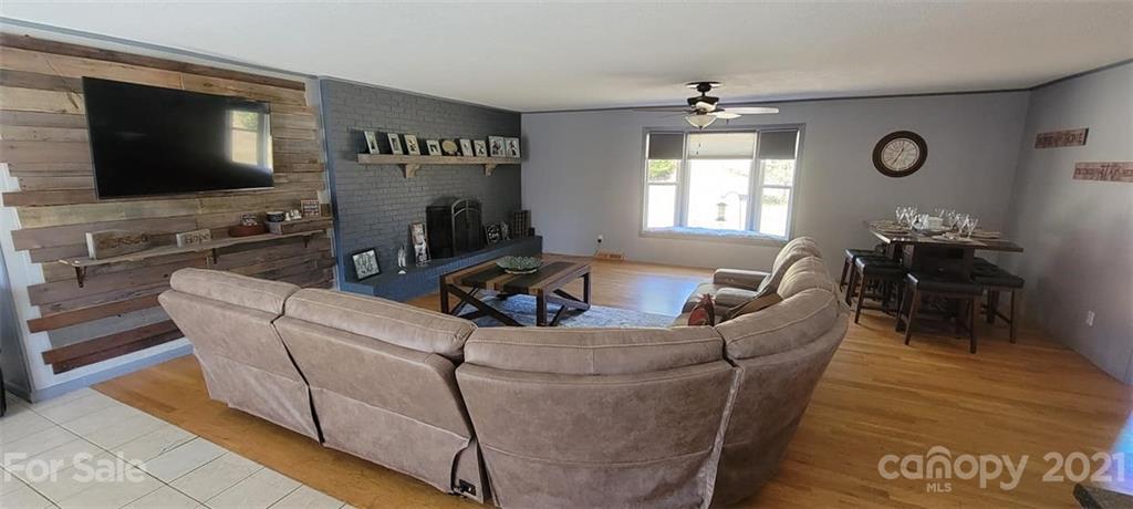 787 Cleghorn Mill Road Rutherfordton, NC 28139 - Photo 14 of 32 a living room with furniture and a flat screen tv
