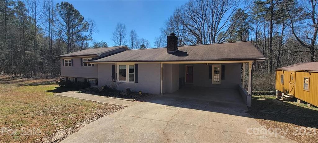 787 Cleghorn Mill Road Rutherfordton, NC 28139 - Photo 3 of 32 a front view of a house with a yard