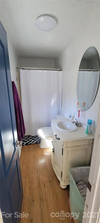 787 Cleghorn Mill Road Rutherfordton, NC 28139 - Photo 21 of 32 a room with a mirror and a fan