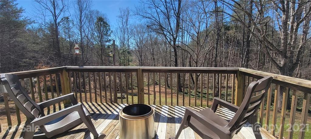 787 Cleghorn Mill Road Rutherfordton, NC 28139 - Photo 22 of 32 a view of a balcony with wooden floor and fence