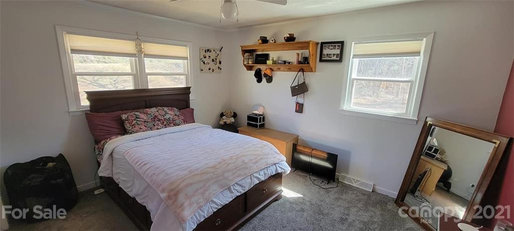 787 Cleghorn Mill Road Rutherfordton, NC 28139 - Photo 23 of 32 a bedroom with a bed and a window