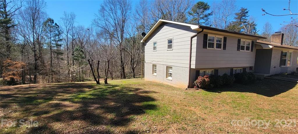 787 Cleghorn Mill Road Rutherfordton, NC 28139 - Photo 4 of 32 a view of a house with a yard
