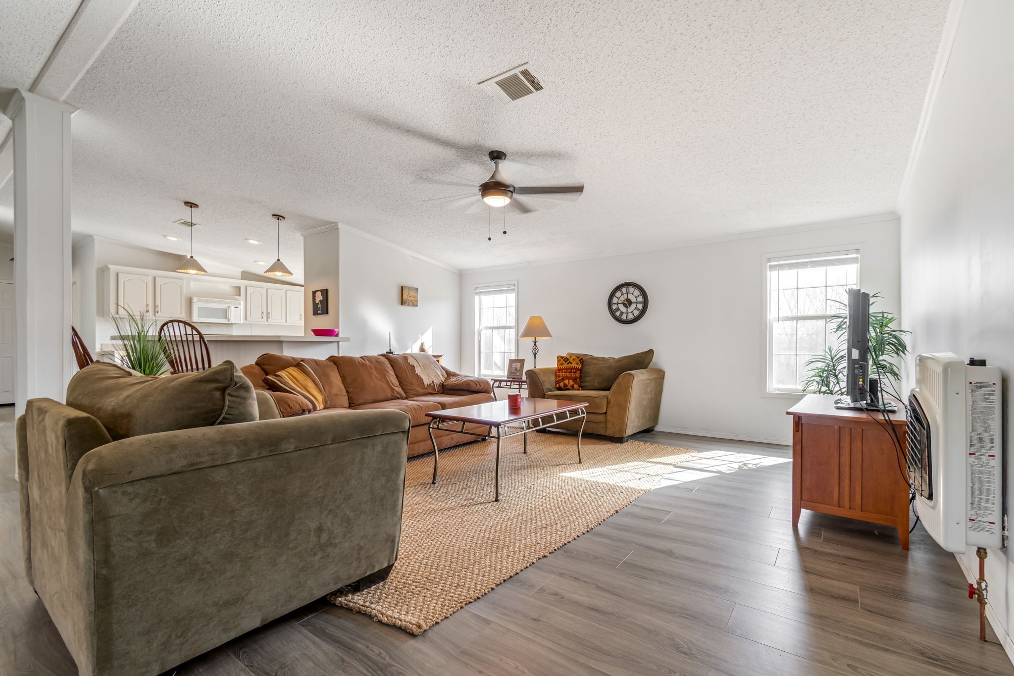 801 Collier Bend Road Charlotte, TN 37036 - Photo 14 of 100 a living room with furniture or chandelier and a wooden floor