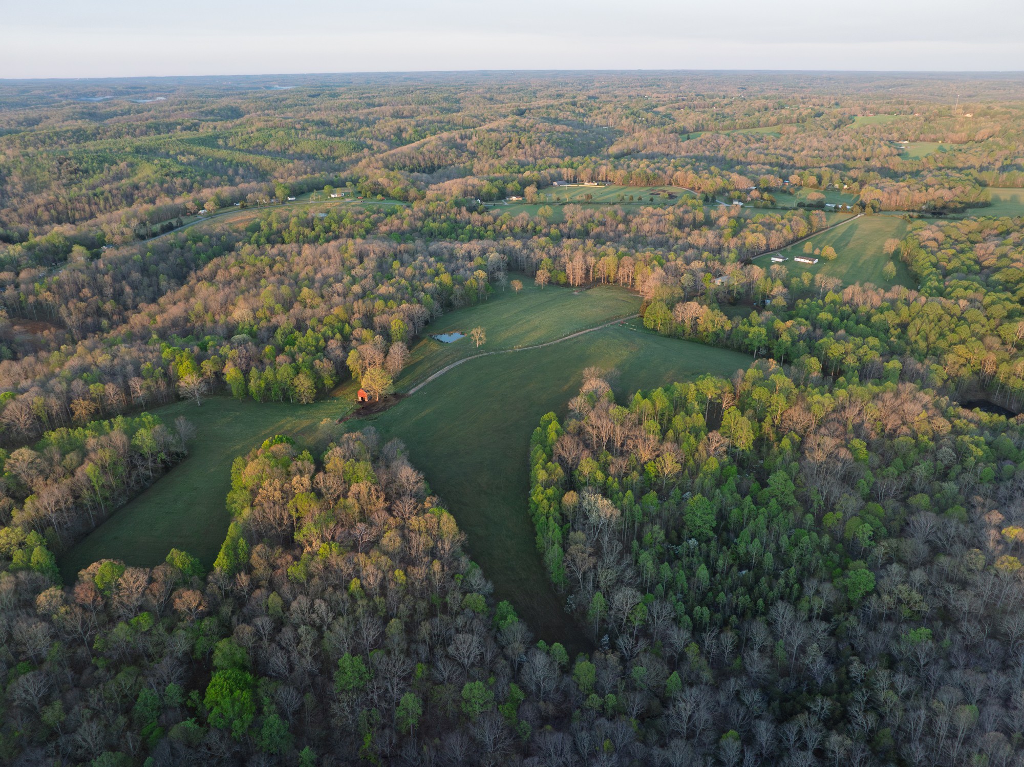 801 Collier Bend Road Charlotte, TN 37036 - Photo 88 of 100 an aerial view of lake residential houses with outdoor space and lake view
