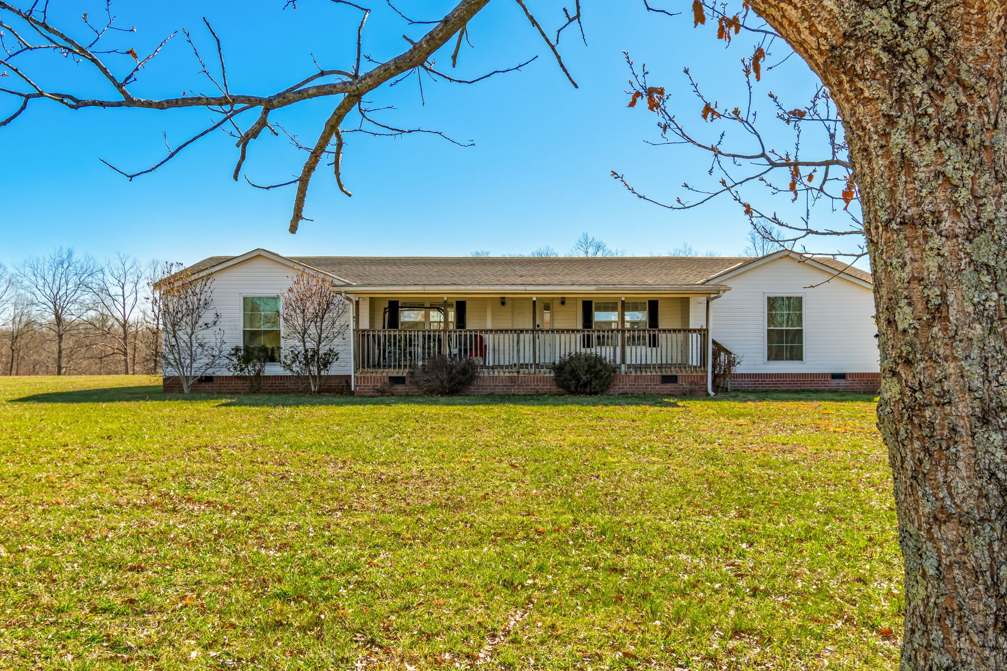 801 Collier Bend Road Charlotte, TN 37036 - Photo 10 of 100 a front view of house with outdoor space and swimming pool