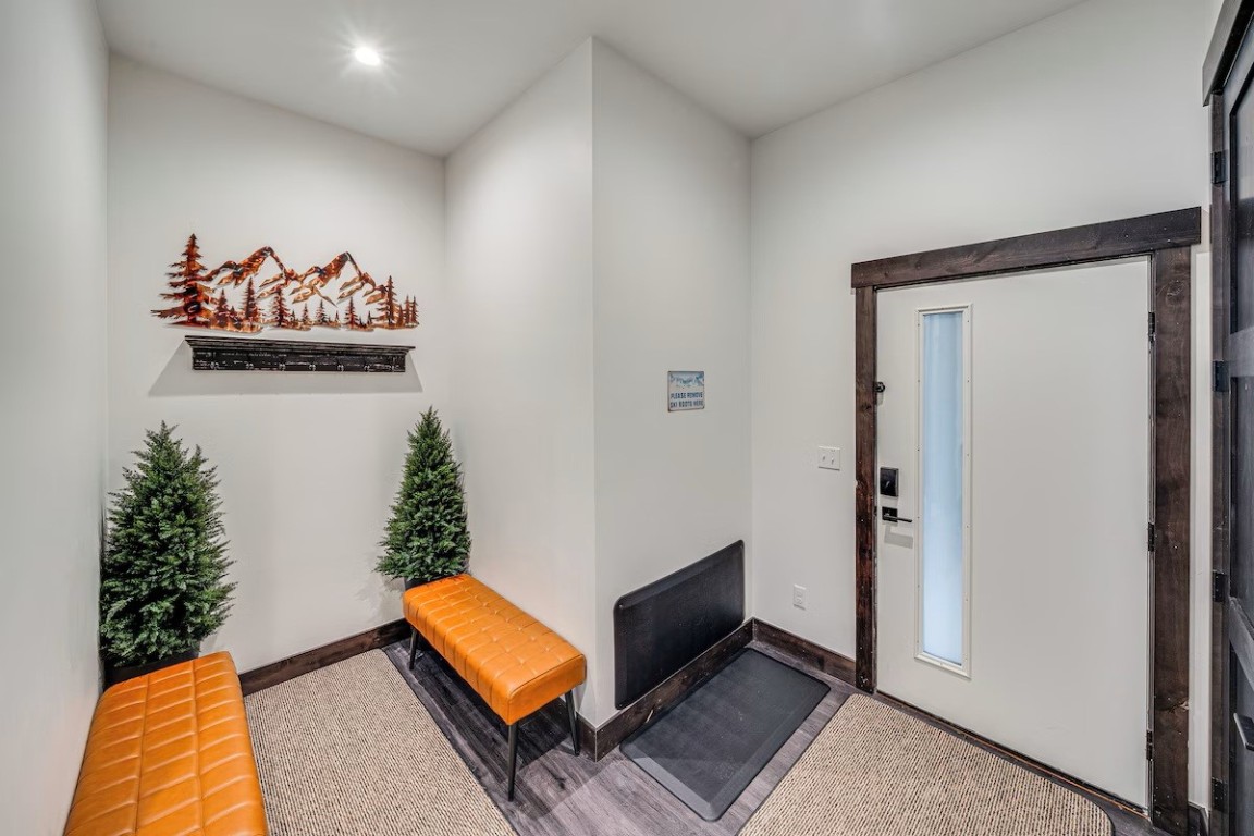 72 Meadow Trail, Unit 104 Fraser, CO 80442 - Photo 17 of 21 a room with toys and wooden floor