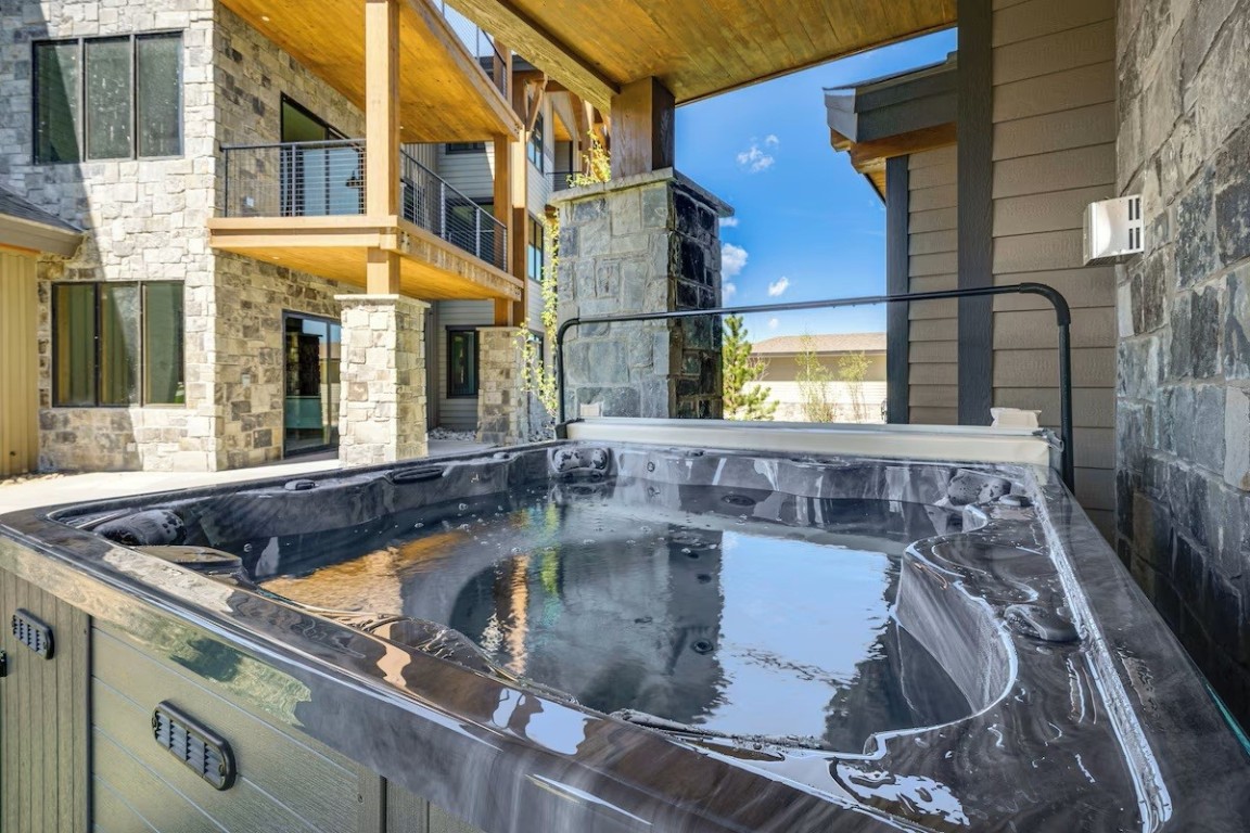 72 Meadow Trail, Unit 104 Fraser, CO 80442 - Photo 6 of 21 a view of a patio with swimming pool