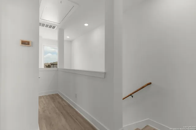 a view of small space with racks on the wall