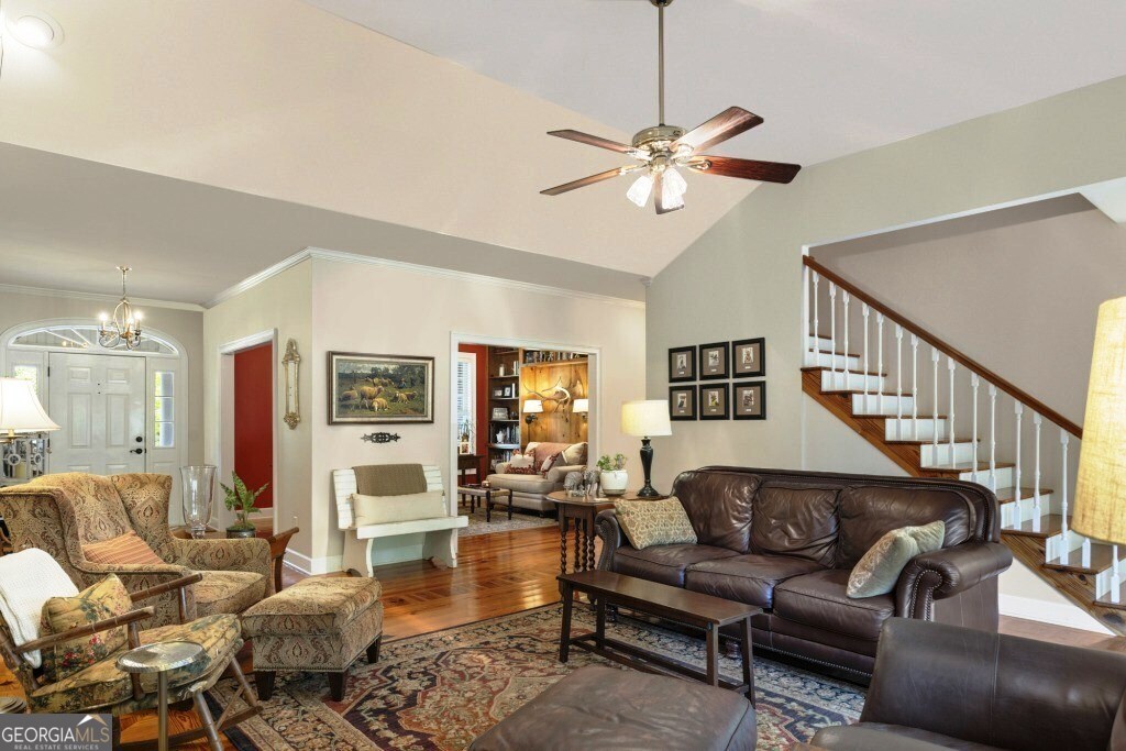 426 Wadley Coleman Lake Road Swainsboro, GA 30401 - Photo 24 of 79 a living room with furniture and a view of kitchen