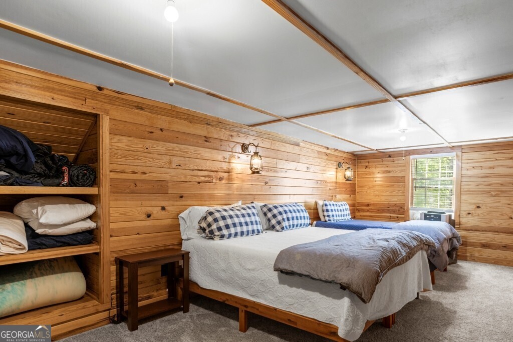 426 Wadley Coleman Lake Road Swainsboro, GA 30401 - Photo 41 of 79 a bedroom with a bed and window