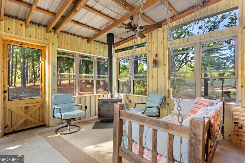 426 Wadley Coleman Lake Road Swainsboro, GA 30401 - Photo 54 of 79 a building outdoor space with patio furniture and potted plants