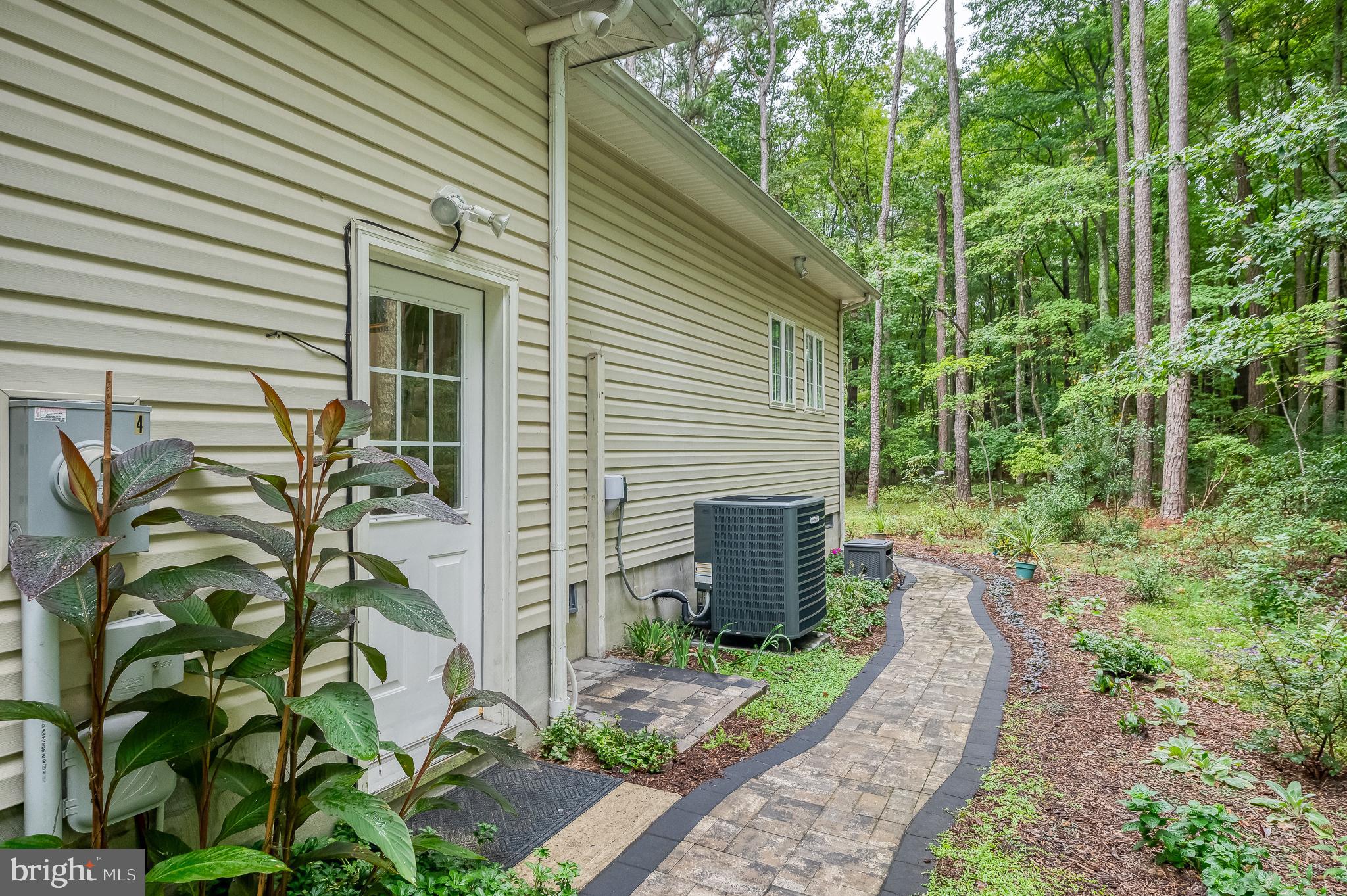 210 Charleston Road Ocean Pines, MD 21811 - Photo 67 of 83 Side with stone walkway