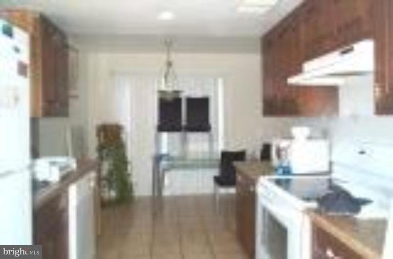 7115 Itte Lane Springfield, VA 22150 - Photo 4 of 8 Kitchen/Dining Room