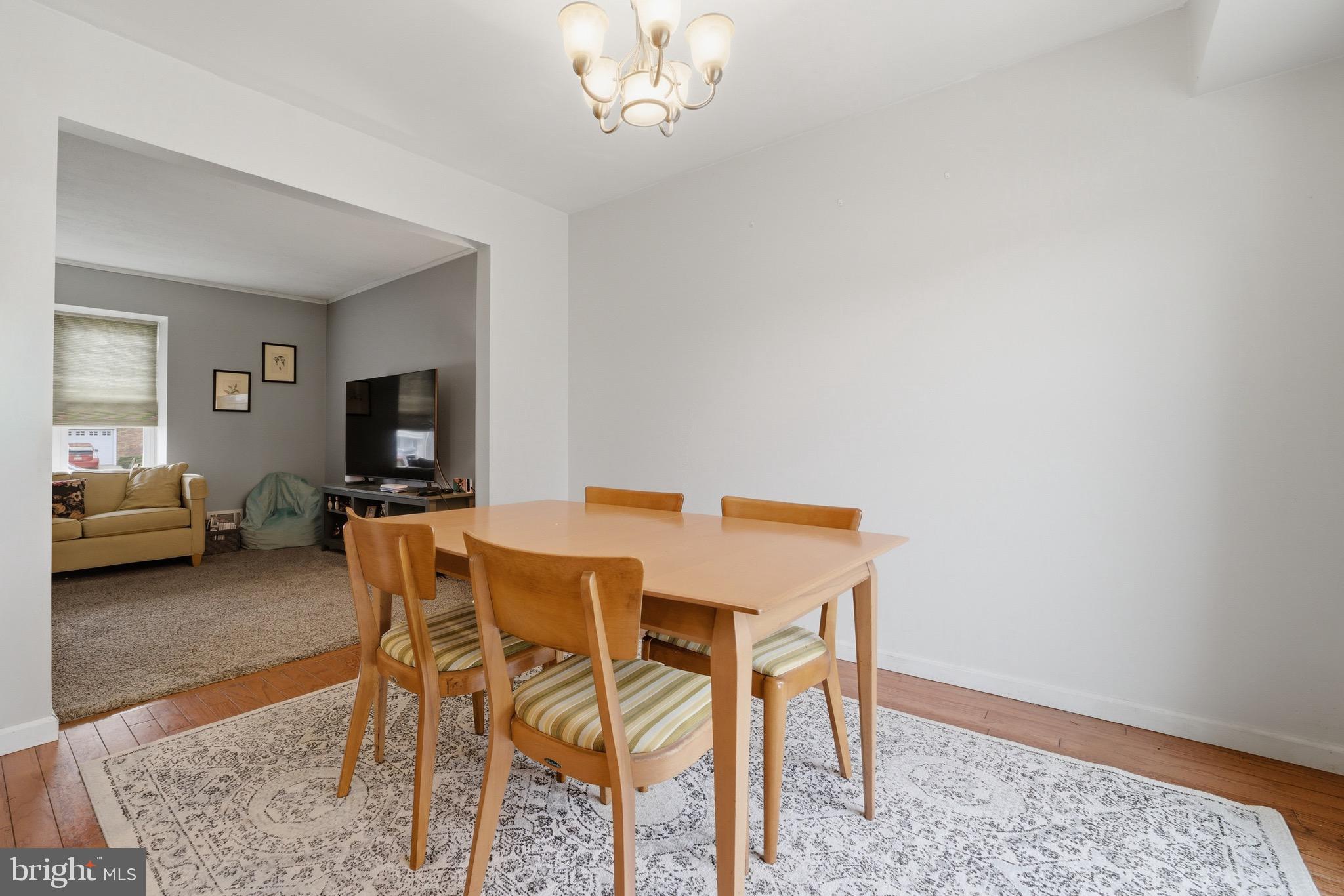 14 Woodhurst Drive Mount Holly, NJ 08060 - Photo 12 of 24 a view of a dining room with furniture and a chandelier