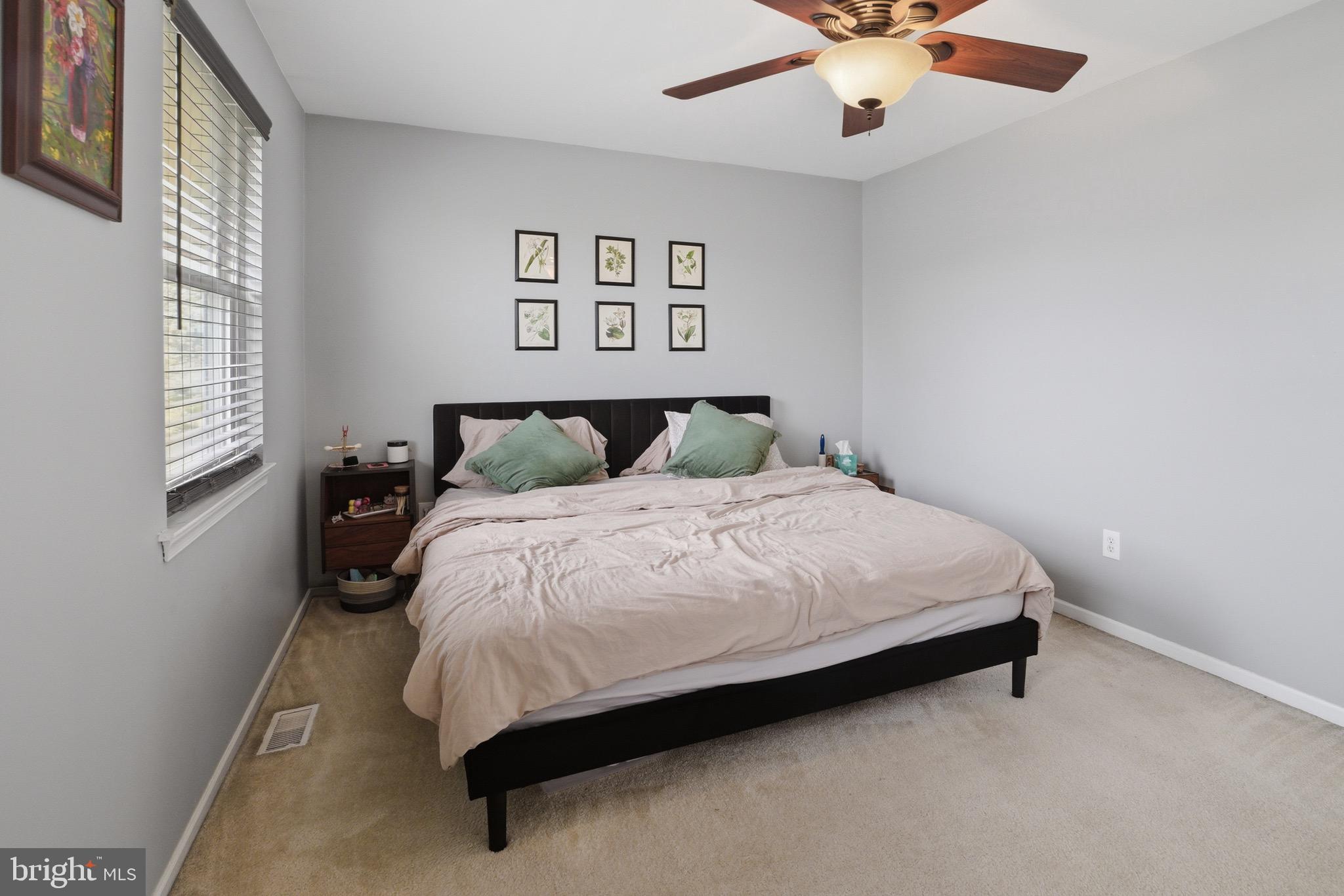 14 Woodhurst Drive Mount Holly, NJ 08060 - Photo 16 of 24 a bedroom with a bed and window