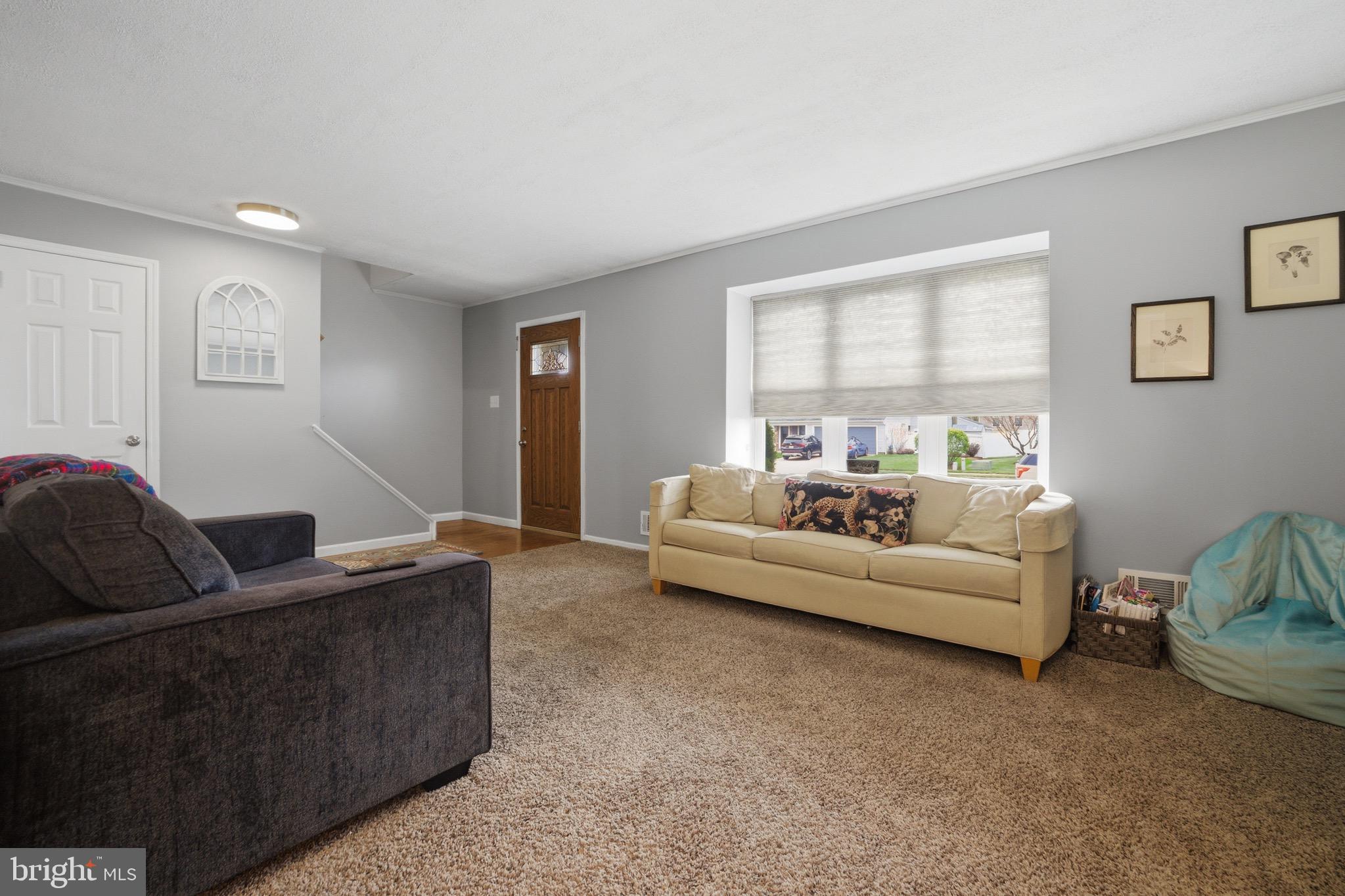 14 Woodhurst Drive Mount Holly, NJ 08060 - Photo 4 of 24 a living room with furniture and a window