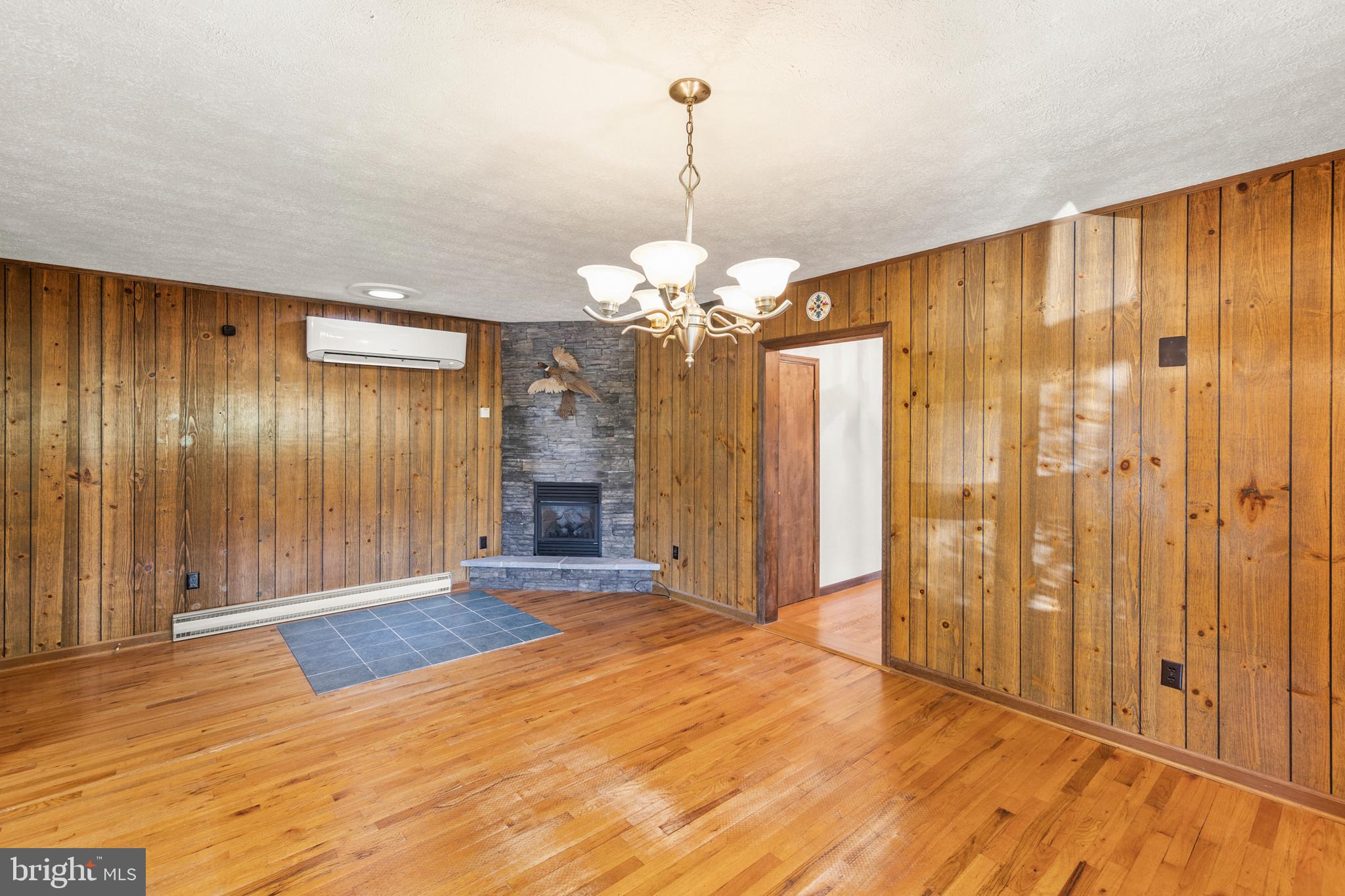 170 Frye Path Road Gore, VA 22637 - Photo 12 of 50 a view of a room with wooden floor chandelier and entryway