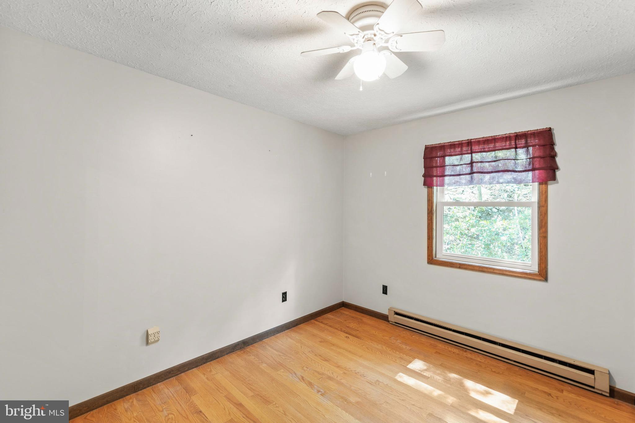 170 Frye Path Road Gore, VA 22637 - Photo 19 of 50 an empty room with windows