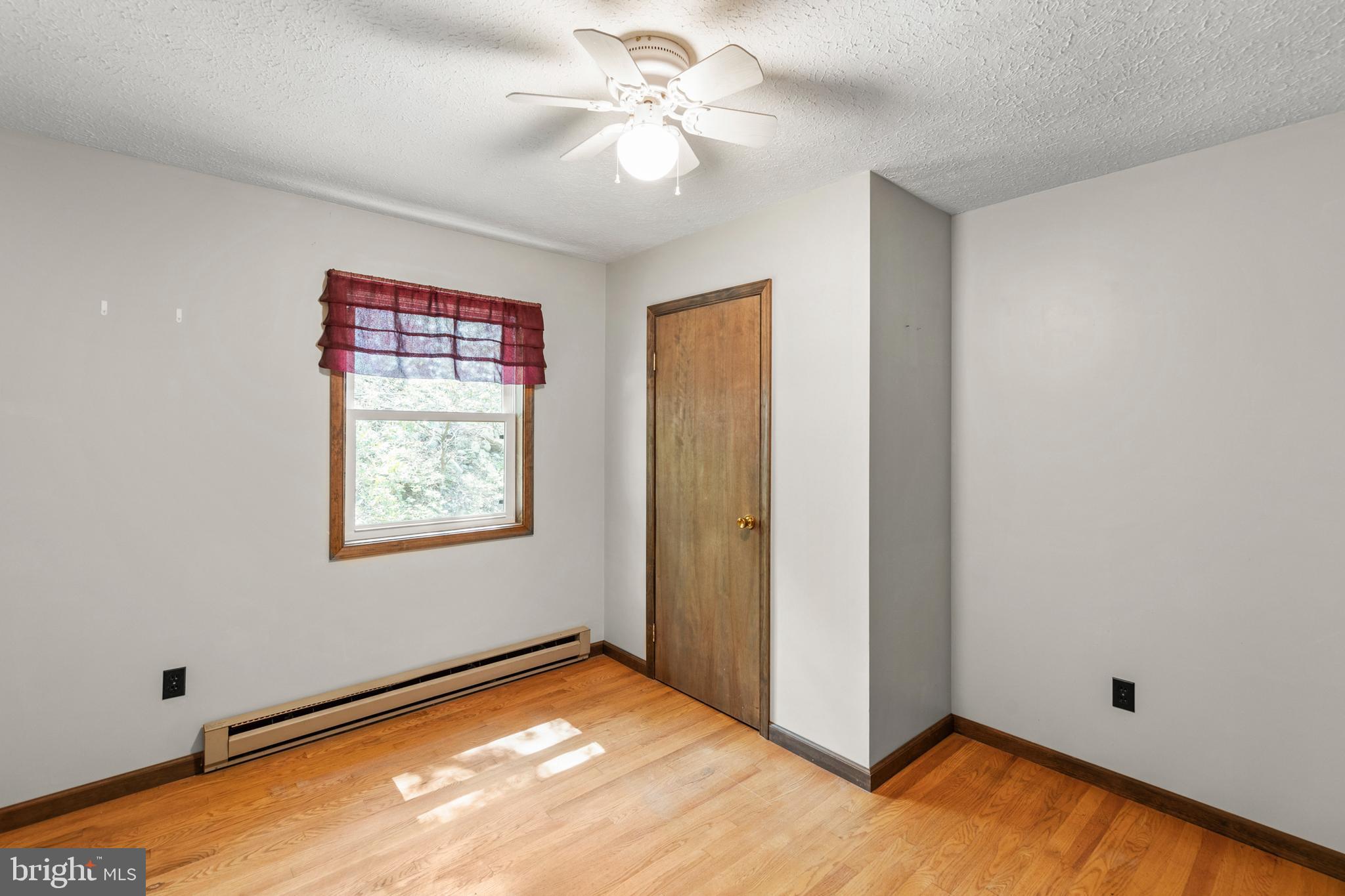 170 Frye Path Road Gore, VA 22637 - Photo 20 of 50 a view of a room with window and ceiling fan