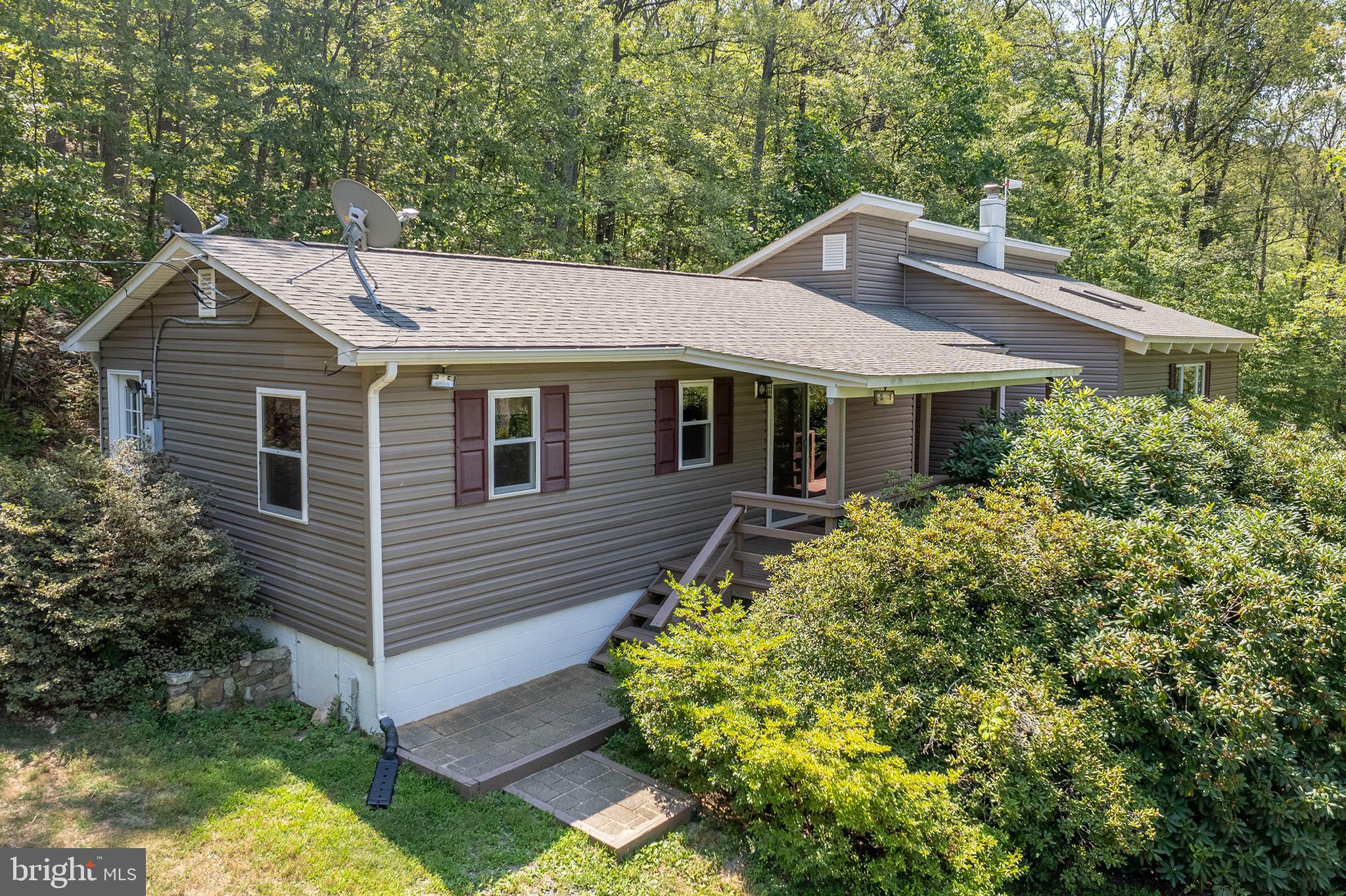 170 Frye Path Road Gore, VA 22637 - Photo 3 of 50 a front view of a house with garden
