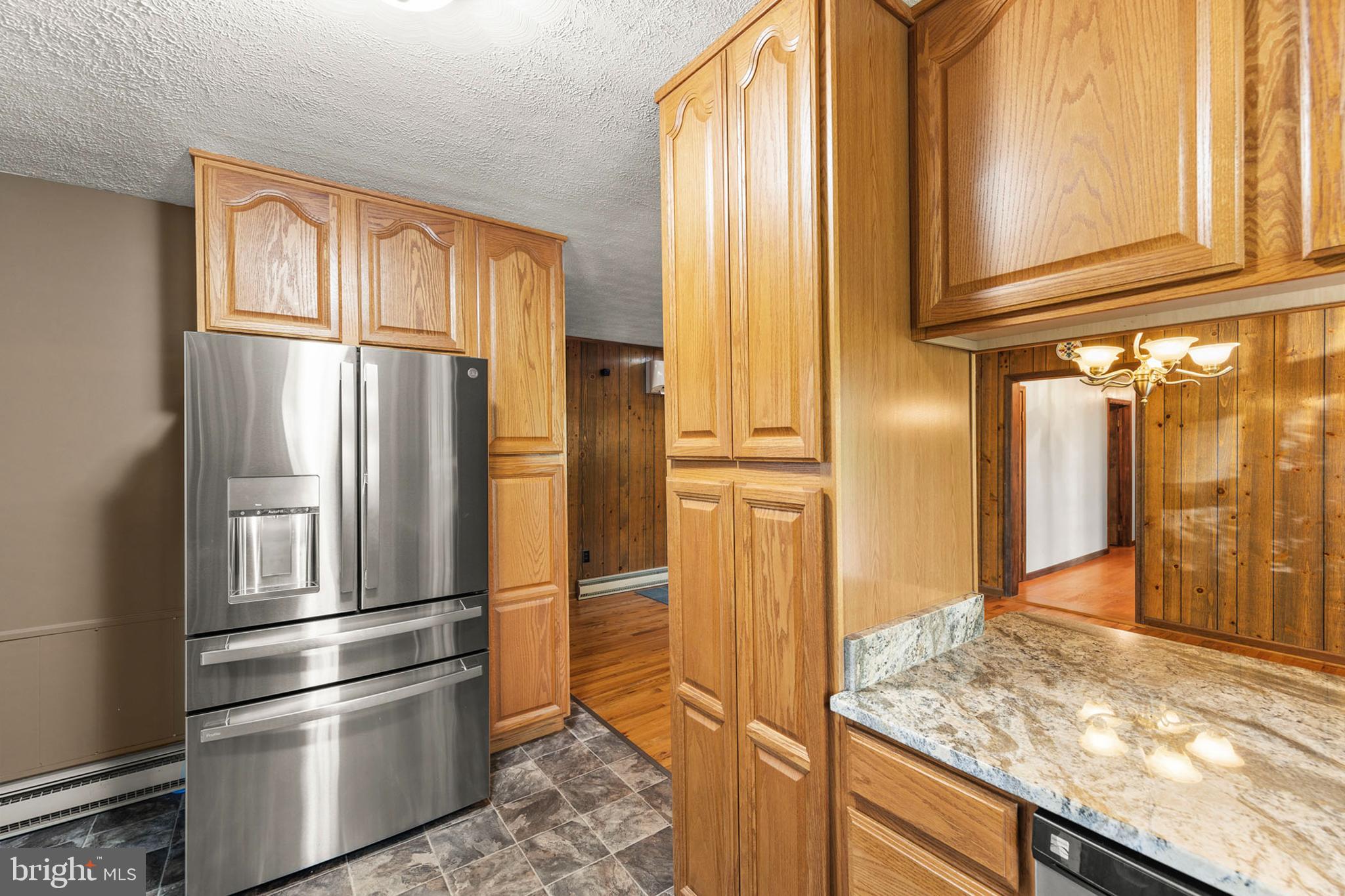 170 Frye Path Road Gore, VA 22637 - Photo 10 of 50 a kitchen with stainless steel appliances granite countertop a refrigerator and a sink