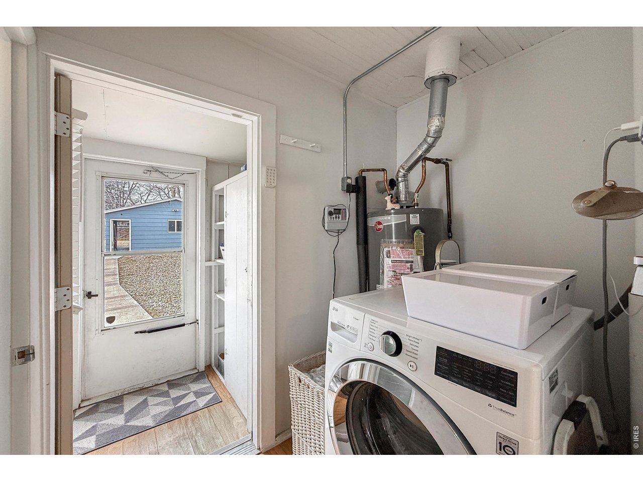 837 5th Street Berthoud, CO 80513 - Photo 14 of 36 a utility room with dryer and washer