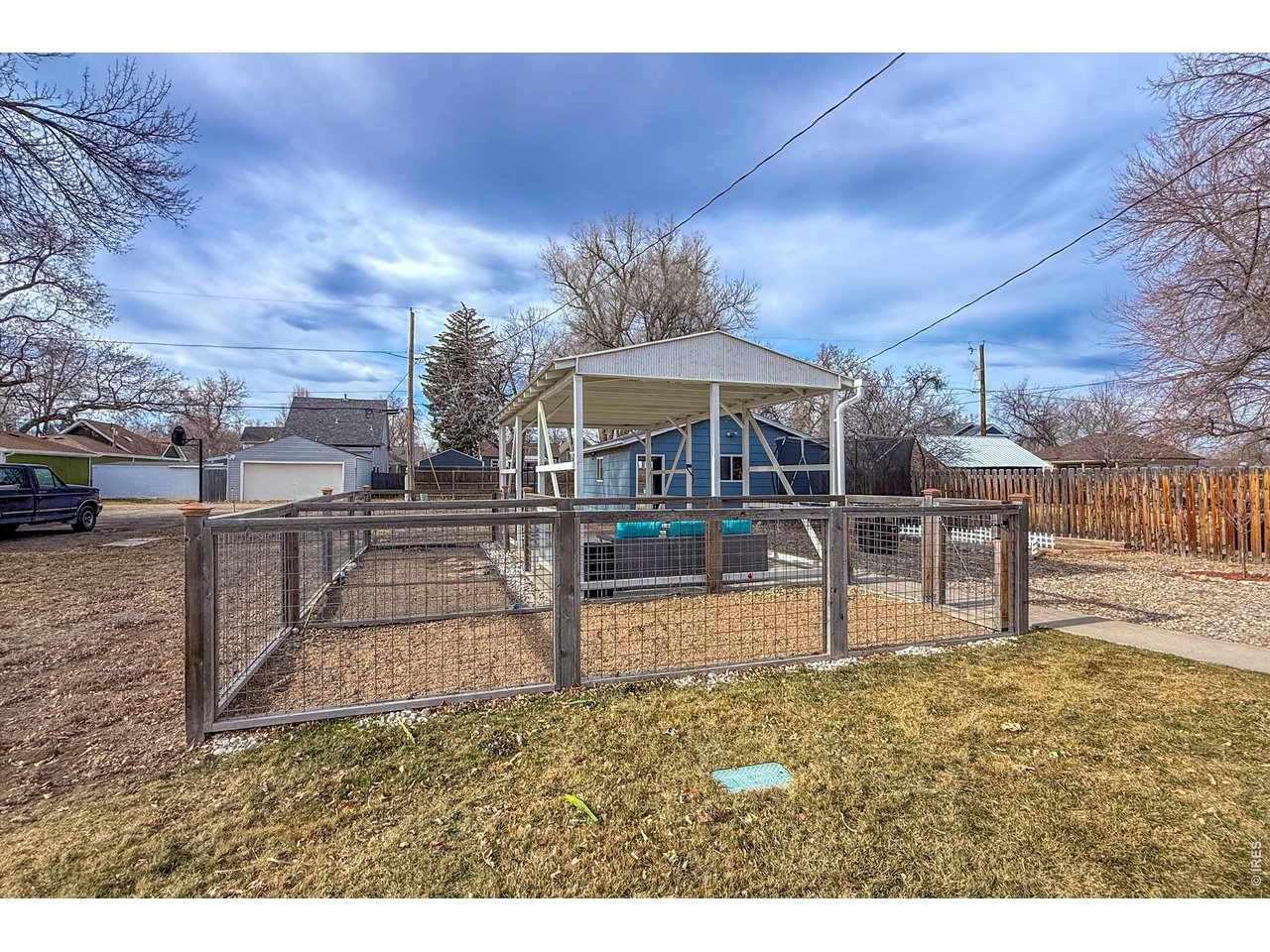 837 5th Street Berthoud, CO 80513 - Photo 27 of 36 a view of a swimming pool with a patio