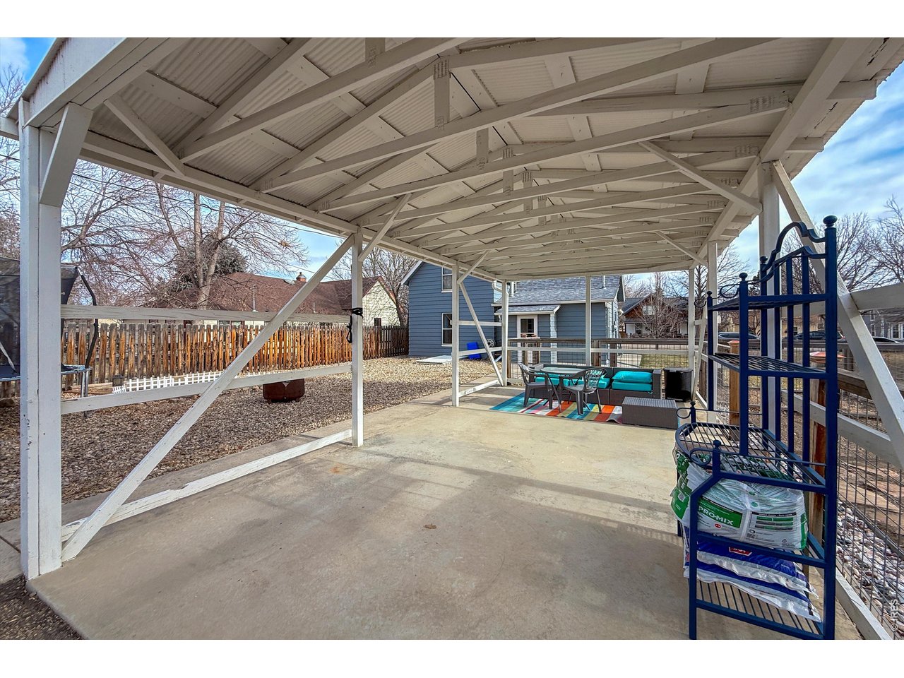 837 5th Street Berthoud, CO 80513 - Photo 28 of 36 a view of a patio with table and chairs