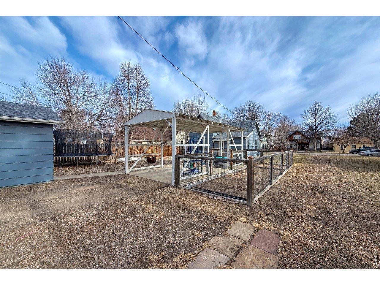 837 5th Street Berthoud, CO 80513 - Photo 31 of 36 a view of a park with large trees
