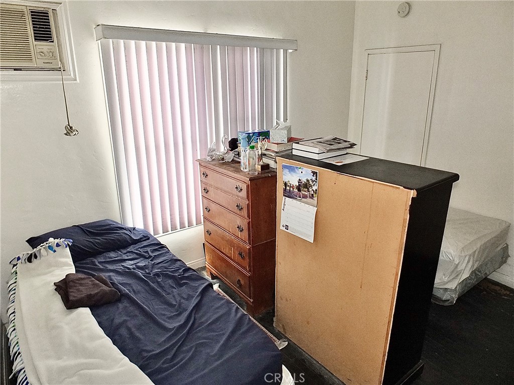 836 Atlantic Avenue Long Beach, CA 90813 - Photo 13 of 27 a living room with furniture and a window
