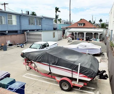 a front view of a house with parking space
