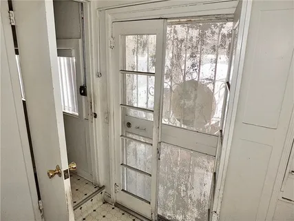 a bathroom with a glass shower door